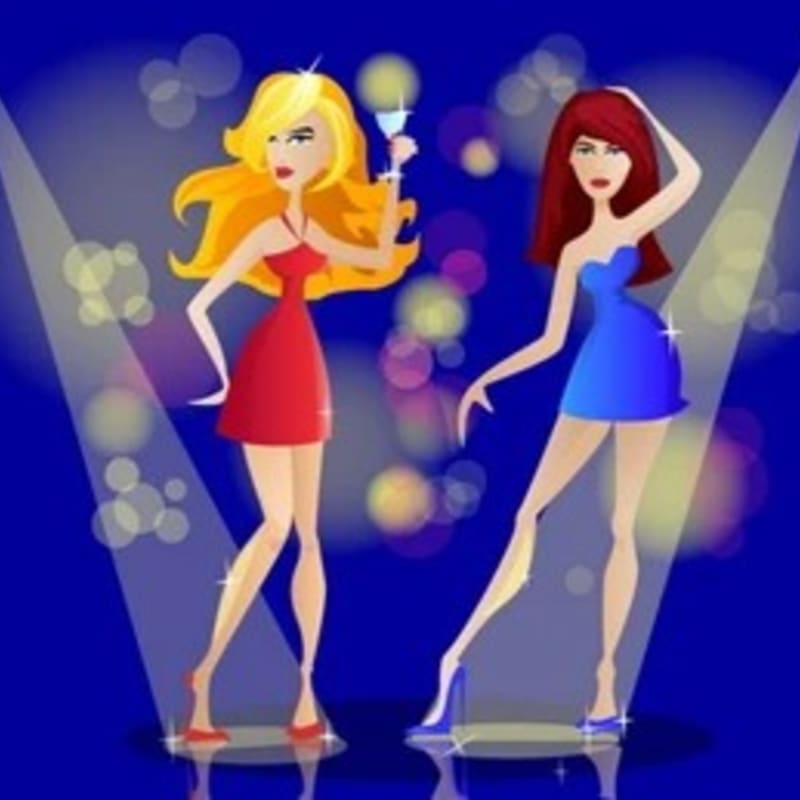 Two women in short dresses, one red and one blue, dance under spotlights against a dark blue background with bokeh lights.