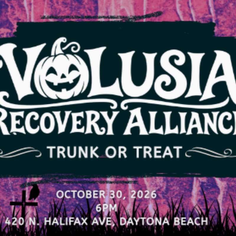 A Halloween-themed flyer for Volusia Recovery Alliance's Trunk or Treat event on October 30, 2026, at 6 PM in Daytona Beach, features a spooky pumpkin and crosses against a textured purple and pink background.