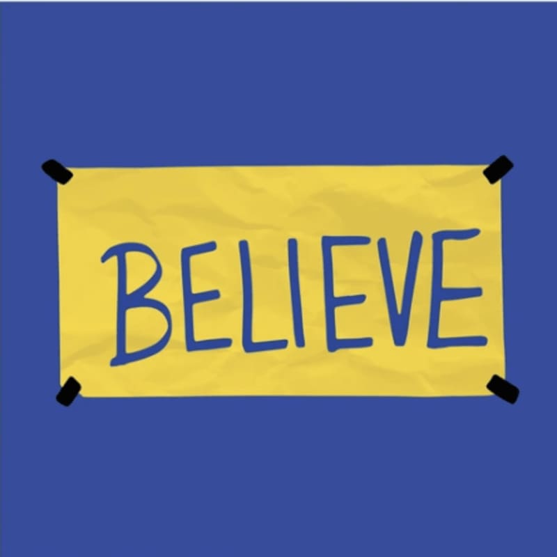 A yellow banner with the word "BELIEVE" written in blue hangs on a solid blue background.