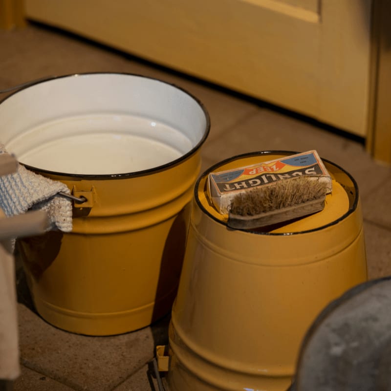 white plastic bucket with lid