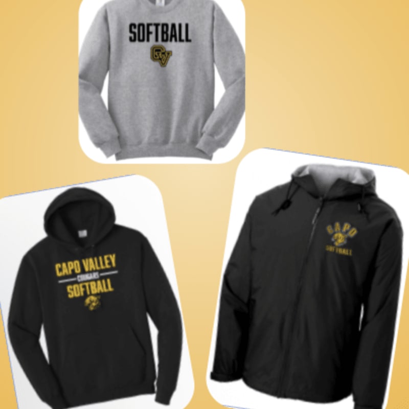 Three pieces of softball apparel, a gray sweatshirt, a black hoodie, and a black jacket, are displayed against a warm, textured background.