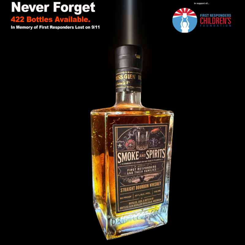A bottle of "Smoke and Spirits" straight bourbon whiskey, commemorating first responders lost on 9/11, stands against a stark black background with memorial text and a foundation logo at the top.