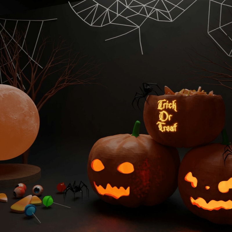 three carved pumpkins sitting next to each other