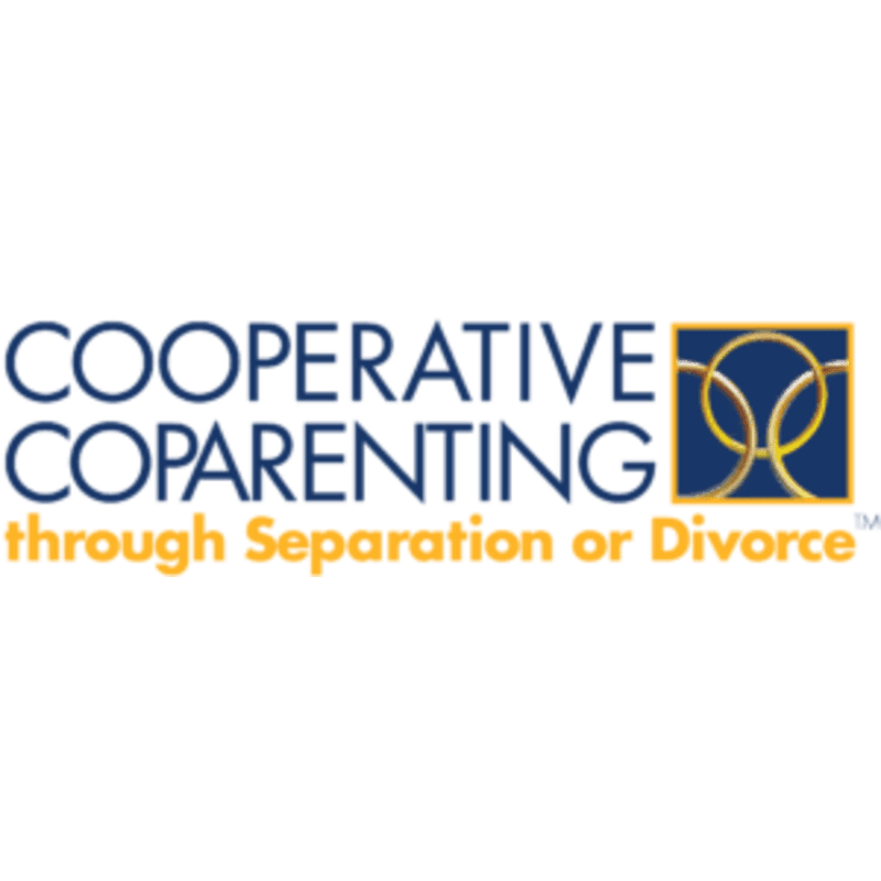 In the foreground, the words "COOPERATIVE COP ARENTING" are written in blue, with "through Separation or Divorce" in yellow below, and in the background, a square contains interlocking gold rings.