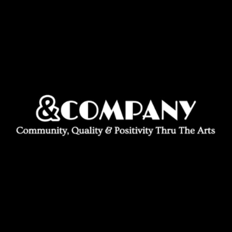 White text on a black background displays "&COMPANY" in large font above the smaller tagline "Community, Quality & Positivity Thru The Arts."