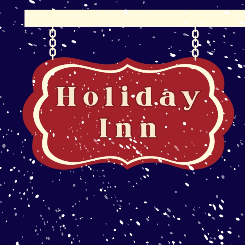A red Holiday Inn sign hangs from chains against a dark blue, snowy background.