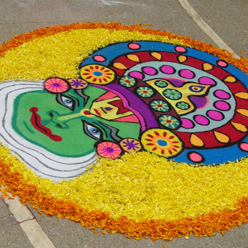 a colorful painting of a woman on the ground