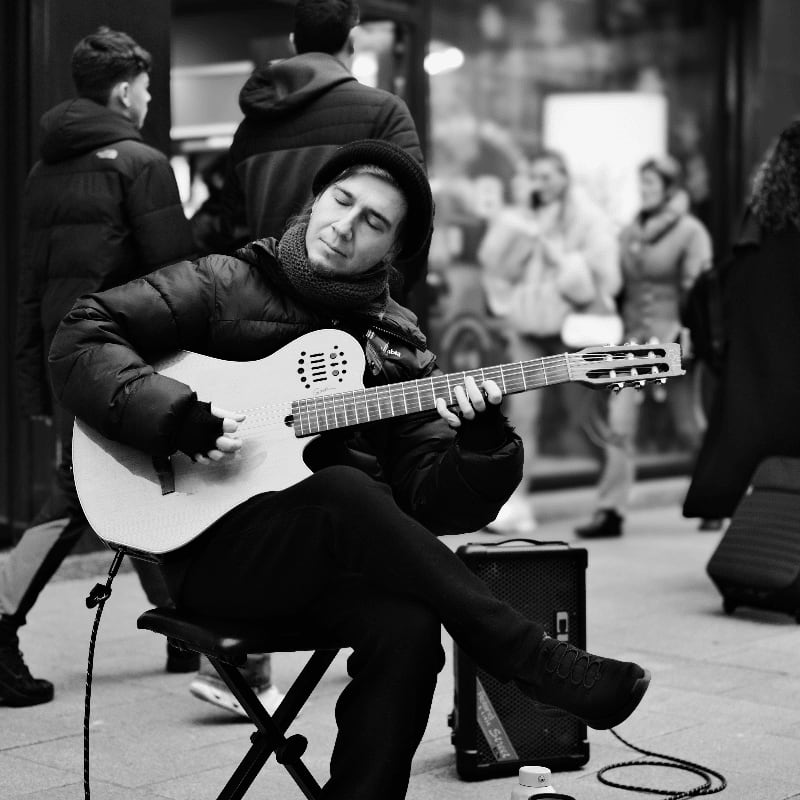 Man playing guitar on the street