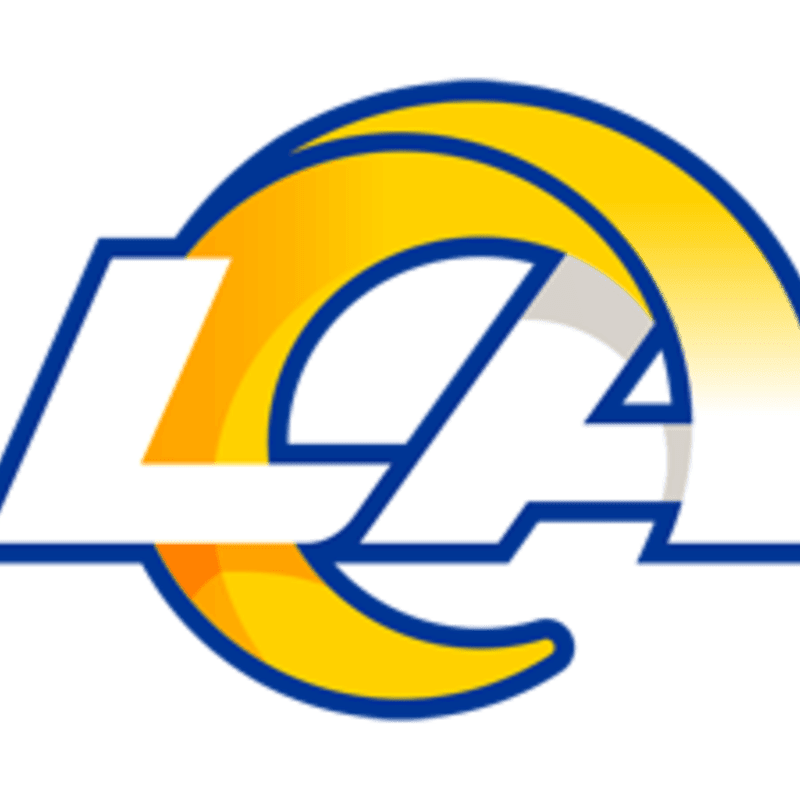 A white "LA" logo with a blue outline is superimposed over a yellow and blue ram's horn design on a white background.
