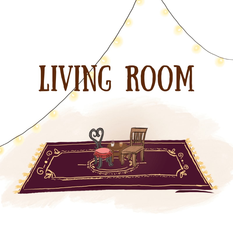 A burgundy rug with gold tassels in the foreground holds a small table with two chairs, while a string of yellow lights hangs in the soft, cream-colored background.
