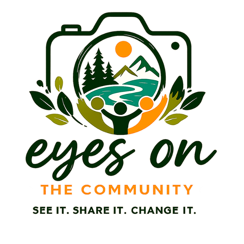 A stylized camera logo with three figures holding hands in the foreground, and a scenic landscape of trees, mountains, and a river within the camera lens in the background.