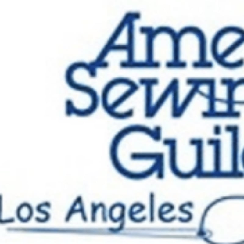 Blue text on a white background reads "American Sewing Guild Los Angeles" with a hand-drawn circle and arrow.