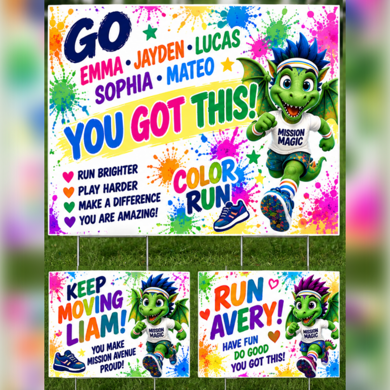 A colorful yard sign featuring a cartoon dragon and motivational messages is displayed on green grass, with two smaller signs below it.