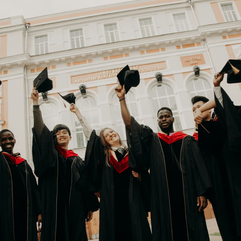group of people wearing black academic dress