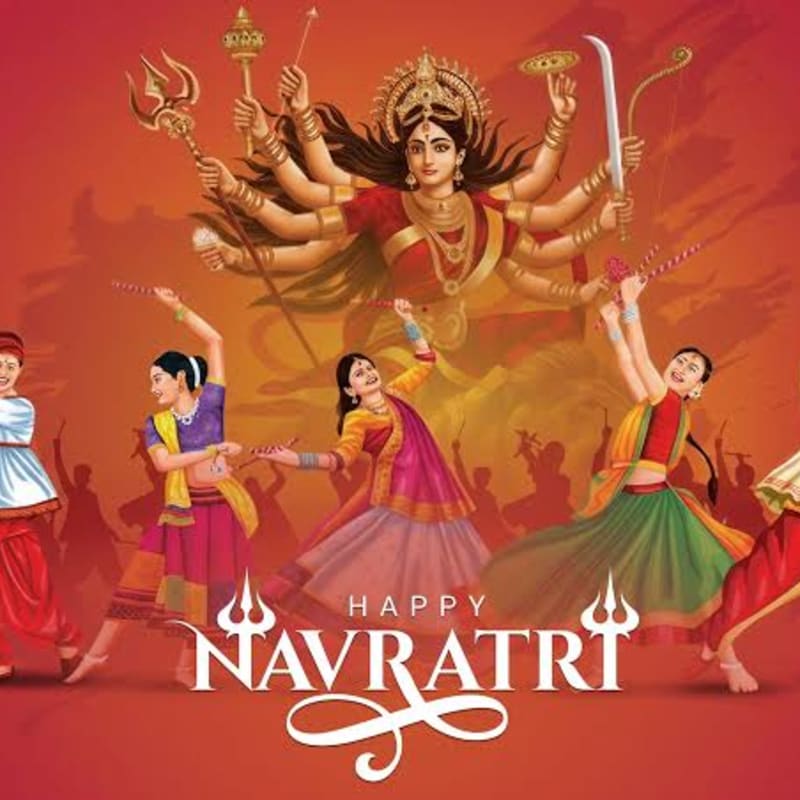 In the foreground, women in colorful attire dance with sticks, while in the background, a multi-armed goddess stands prominently against a warm, gradient sky.