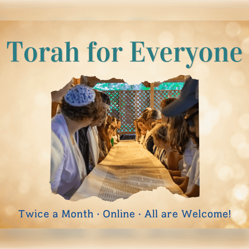 A group of people, some wearing kippahs, gather around a Torah scroll in the foreground, with a rustic wooden structure and greenery visible in the background.