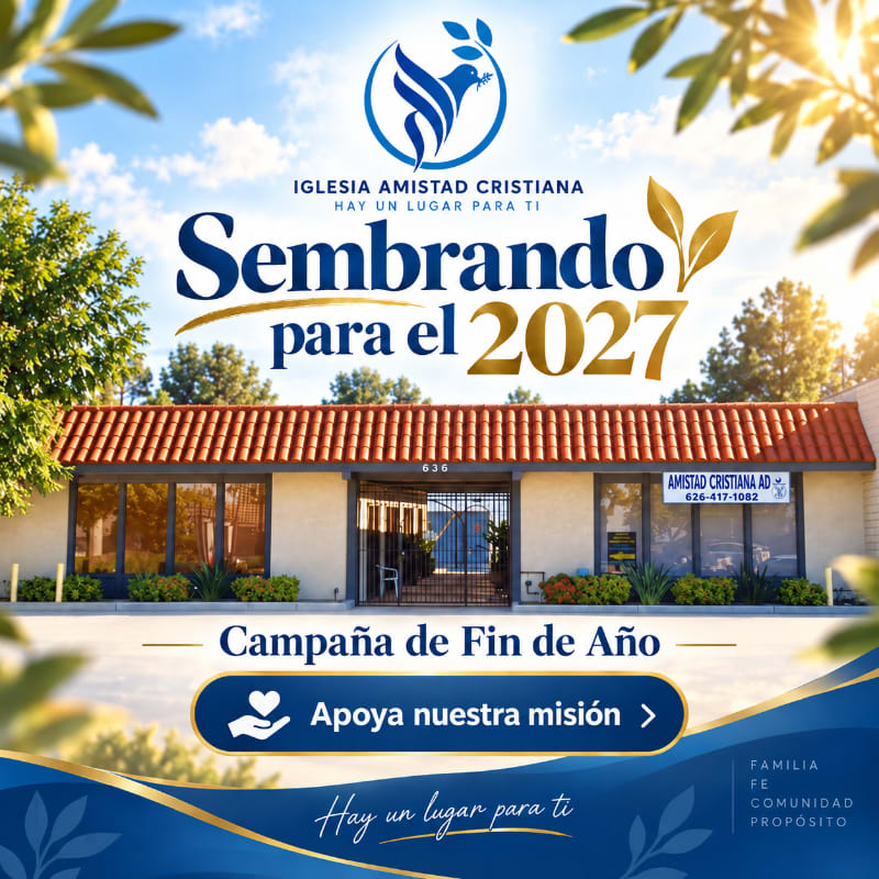 A church building with a banner announcing a year-end campaign is set against a bright sky with foliage in the foreground.
