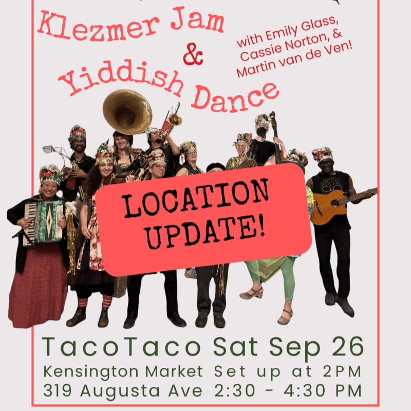 A group of musicians in colorful attire, some playing instruments like a saxophone and accordion, pose in the foreground with a poster advertising a "Klezmer Jam & Yiddish Dance" event in the background.