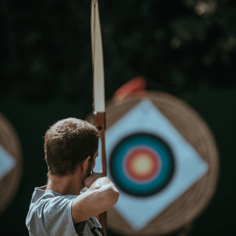 white and brown composite bow