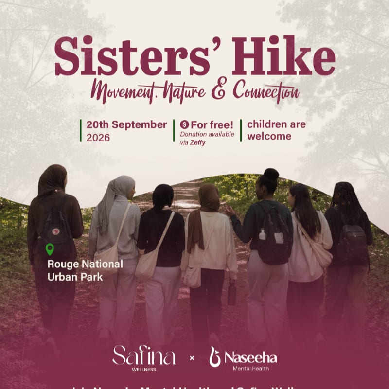 A group of women walk on a path in a park, with text overlaying the image announcing a "Sisters' Hike" event.