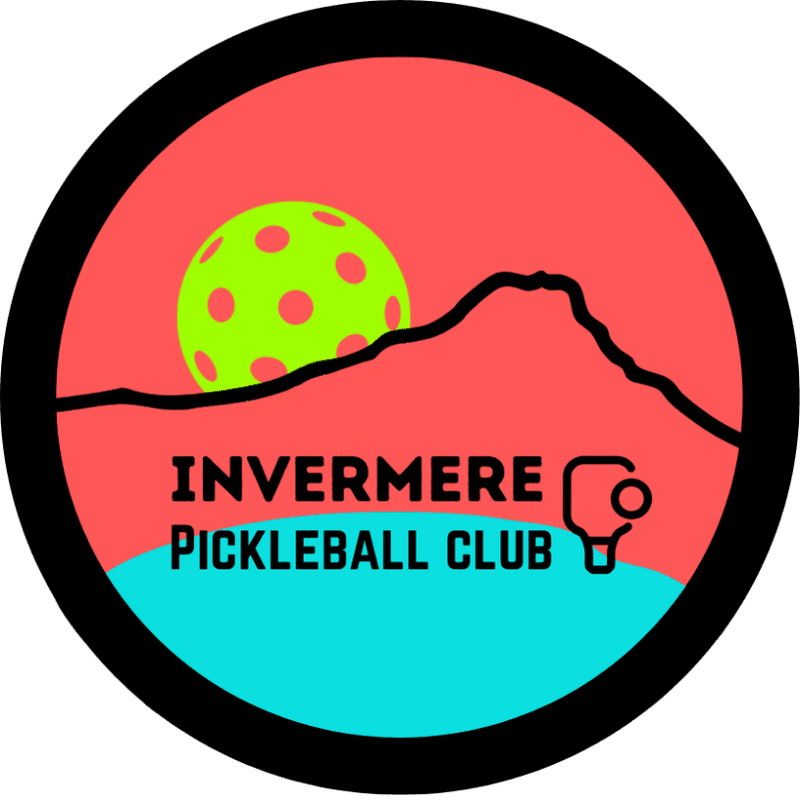 A neon green pickleball sits behind a silhouetted mountain range against a coral sky, with a turquoise body of water in the foreground, all within a black circular border.