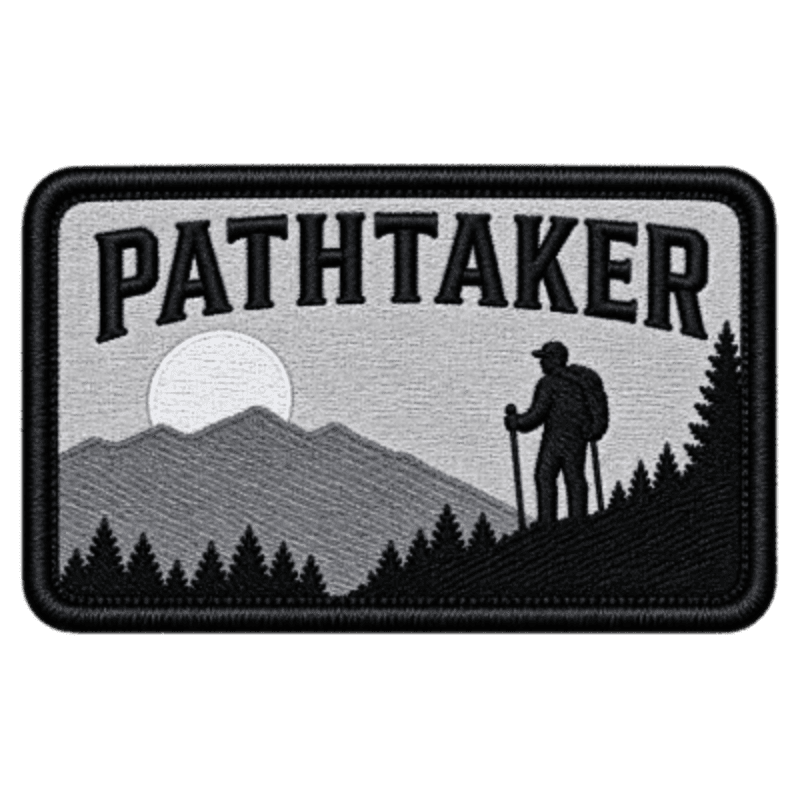 A lone hiker with a backpack and trekking poles stands on a mountain slope in the foreground, silhouetted against a rising sun and distant mountains in the background, with the word "PATHTAKER" emblazoned above.