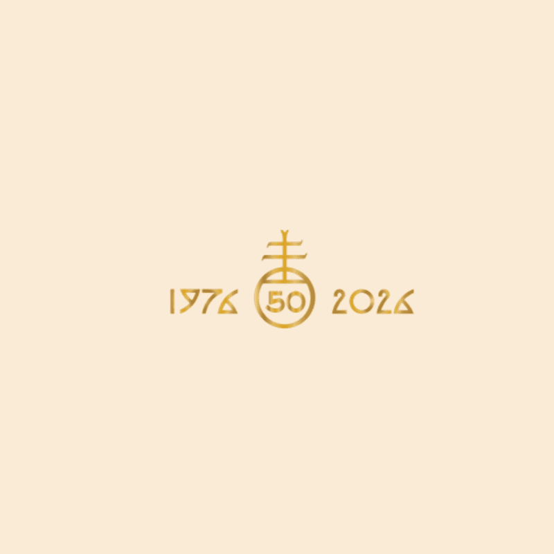 A golden emblem with the numbers "1976" and "2024" flanking a circle containing "50" is centered on a pale cream background.