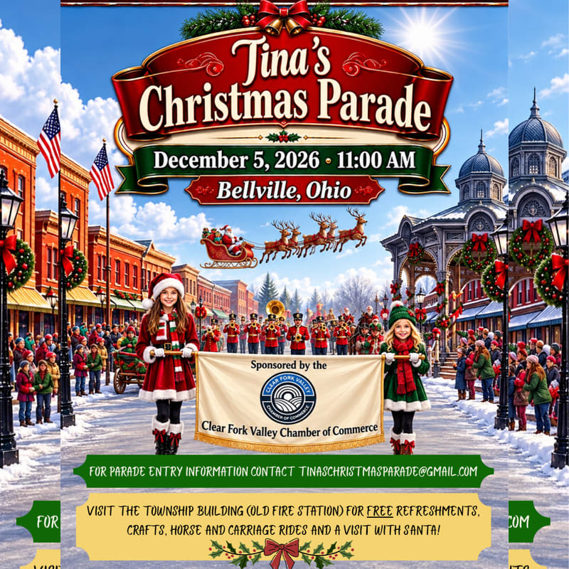 Two young girls in festive attire hold a banner in the foreground of a snowy street scene with a marching band and Santa's sleigh in the background.