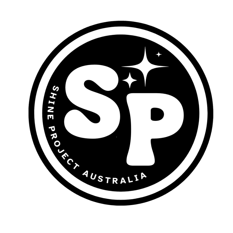 A black and white circular logo features the bold white letters "SP" in the foreground, with the words "SHINE PROJECT AUSTRALIA" encircling them in the background.