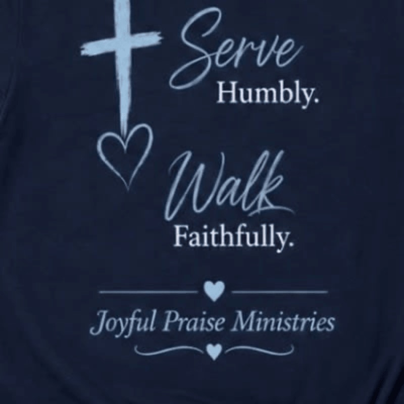 A navy blue background displays a light blue cross with a heart below it, followed by the words "Serve Humbly" and "Walk Faithfully," and finally "Joyful Praise Ministries" with small hearts above and below.