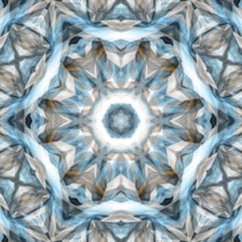 A glowing white hexagonal center is surrounded by symmetrical, crystalline shards of blue and grey that extend to the edges.