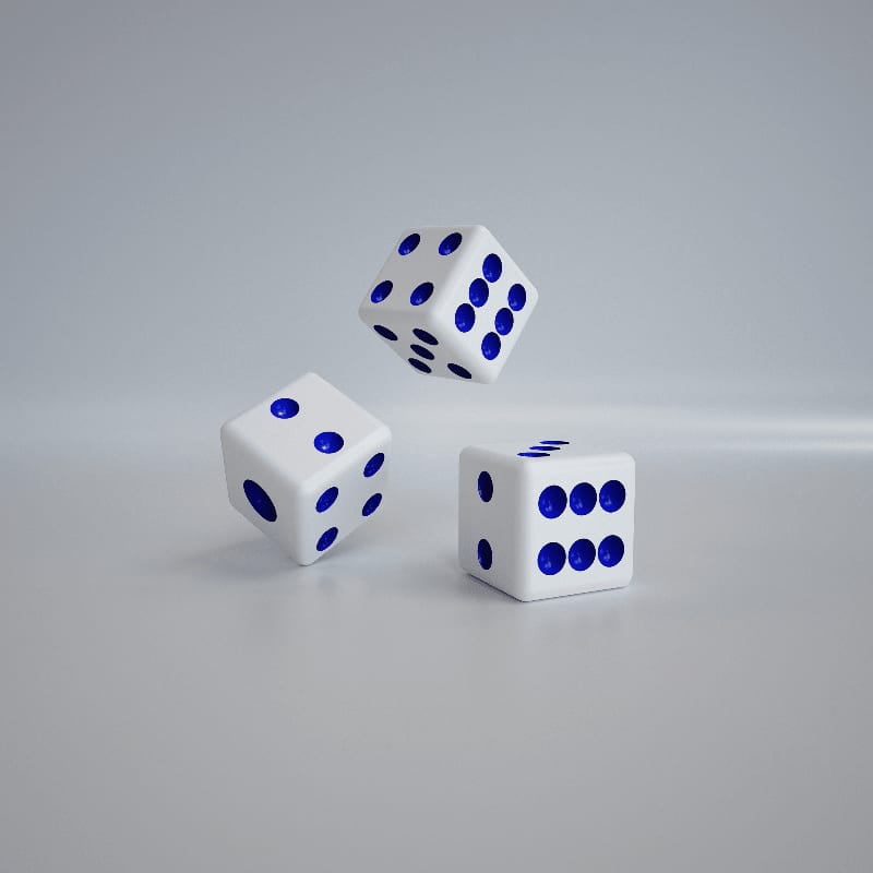 three white dices with blue dots on them