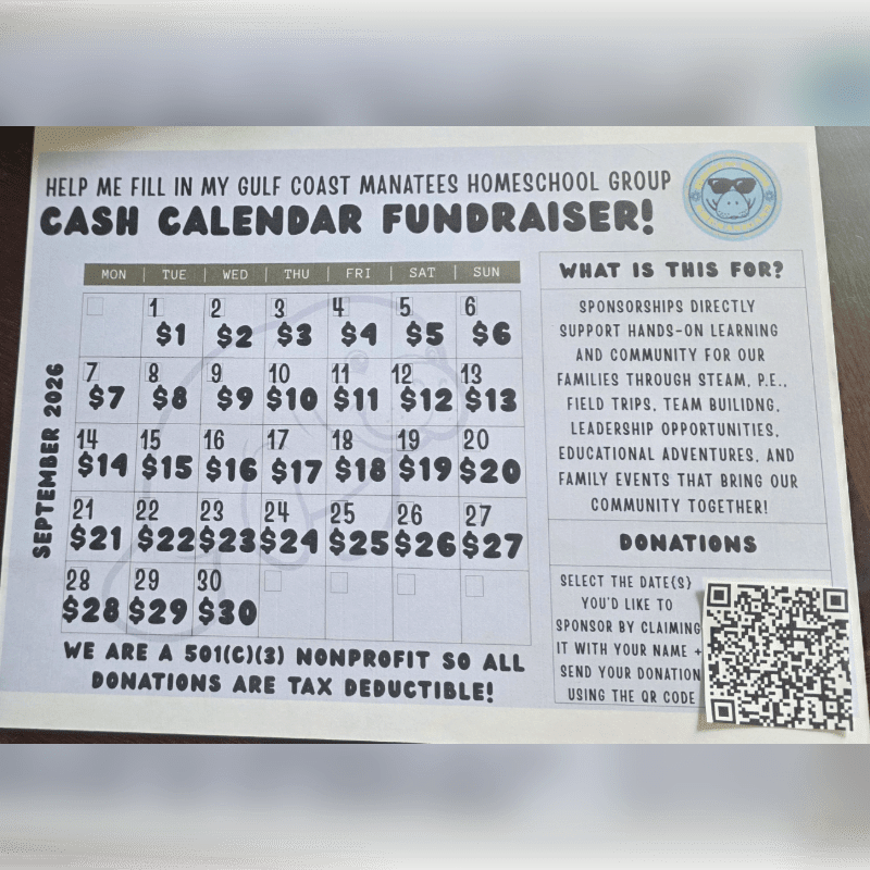 A cash calendar fundraiser flyer for the Gulf Coast Manatees Homeschool Group sits on a plain, neutral-colored surface.