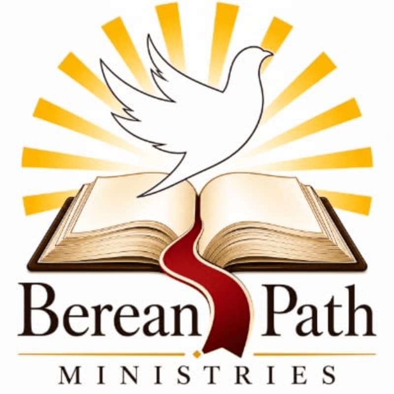 A white dove hovers above an open book with a red ribbon flowing from its pages, set against a backdrop of radiating yellow light.