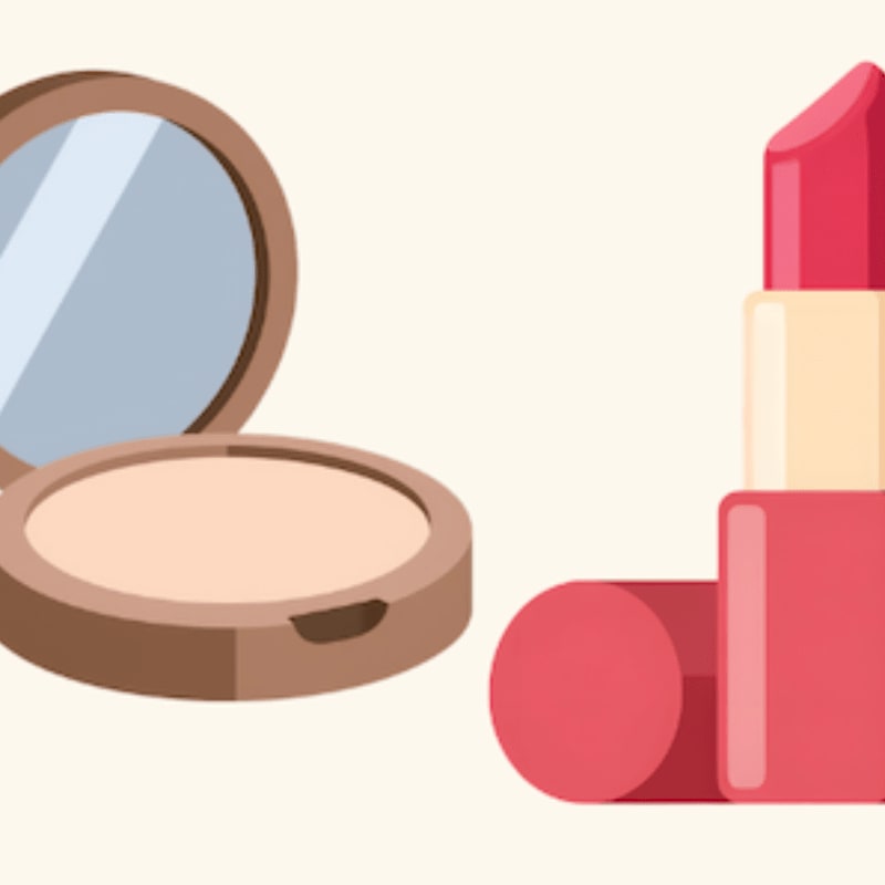 An open compact of powder and a red lipstick stand against a plain, light-colored background.