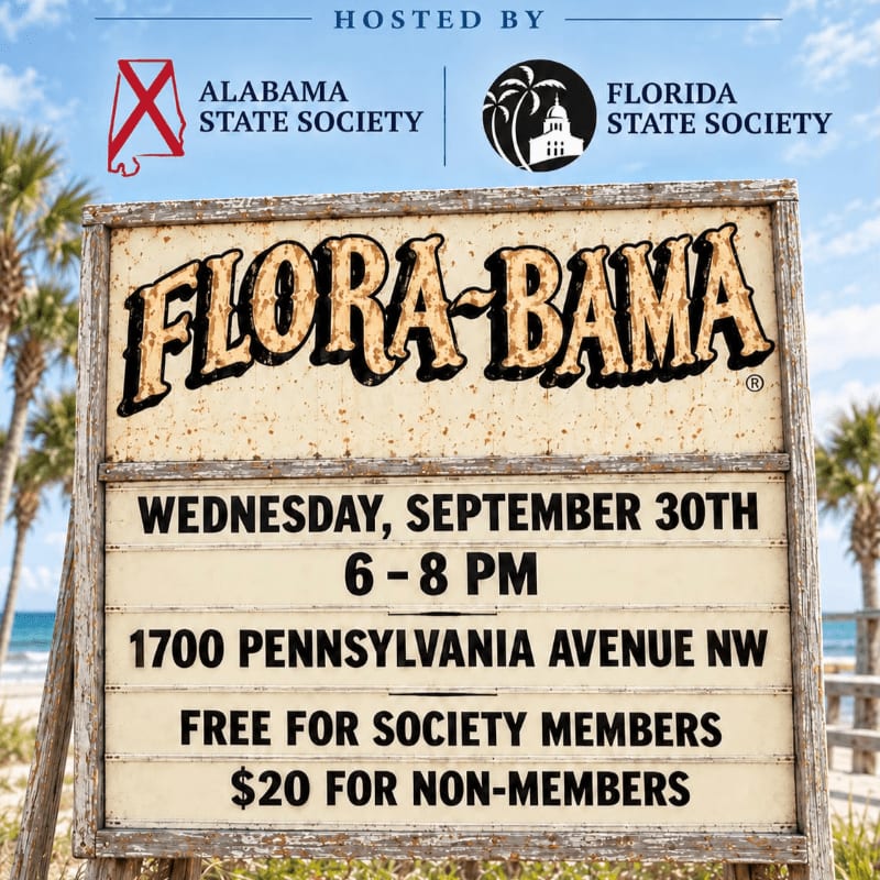 A weathered wooden sign for a Flora-Bama event stands in the foreground against a sunny beach background with palm trees and a blue sky.