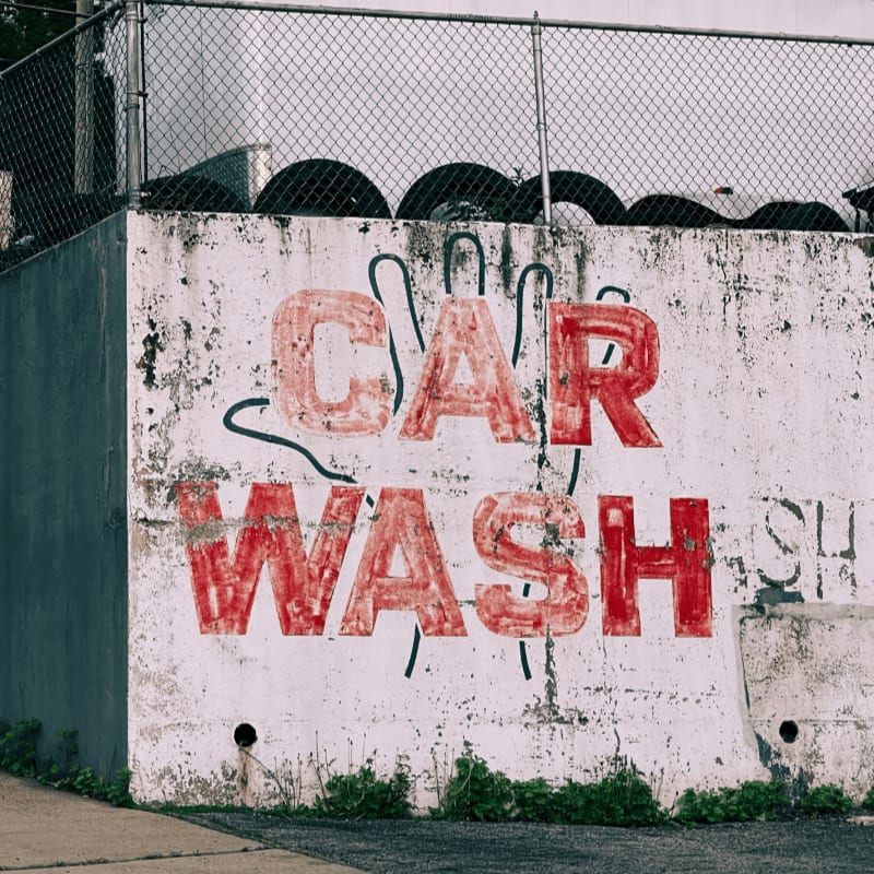 white and red love me love me wall graffiti
