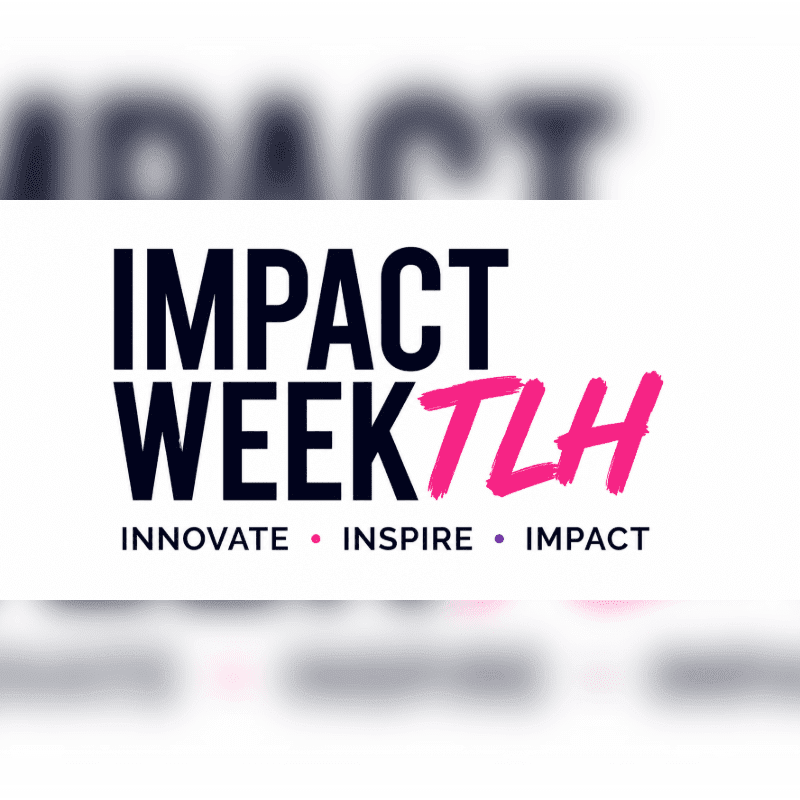 A white rectangular sign with the text "IMPACT WEEK TLH" and the words "INNOVATE • INSPIRE • IMPACT" sits against a blurred white and grey background.