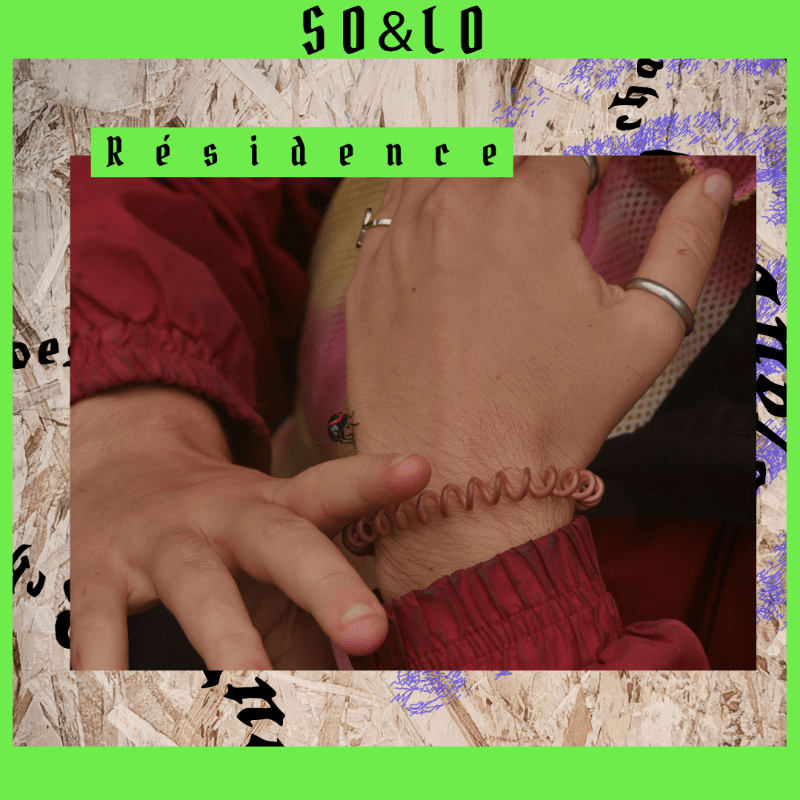 A close-up of hands wearing rings and a spiral bracelet is framed by a textured wood-chip border with green text.