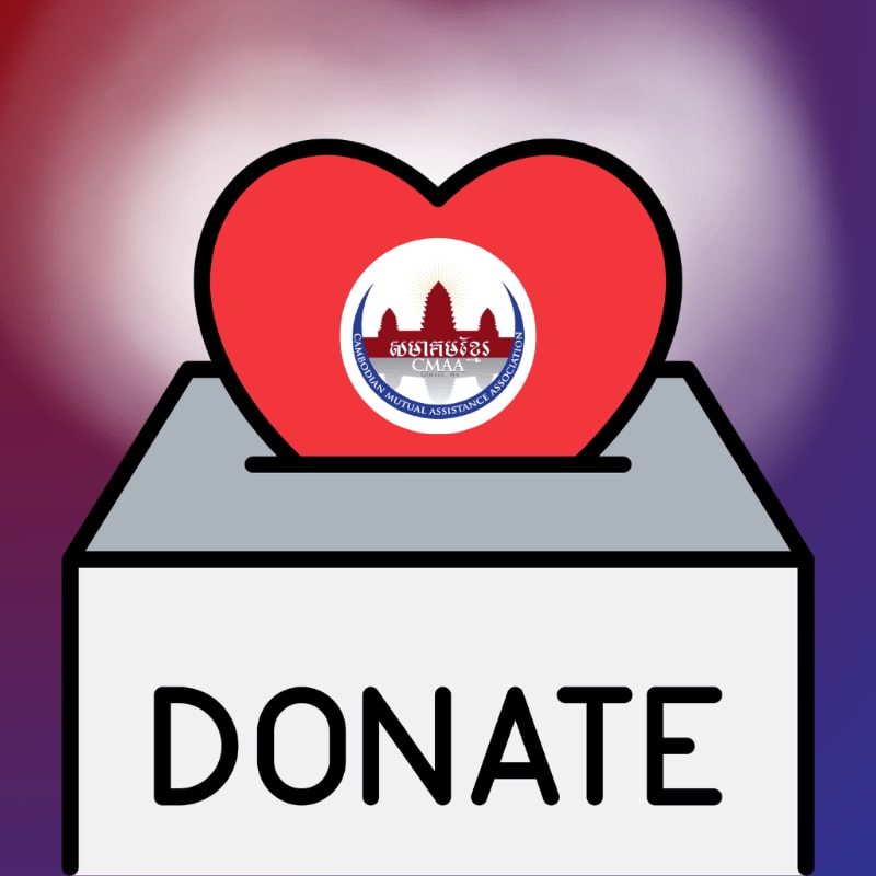 A red heart with a logo sits atop a white donation box labeled "DONATE" against a blurred purple and red gradient background.