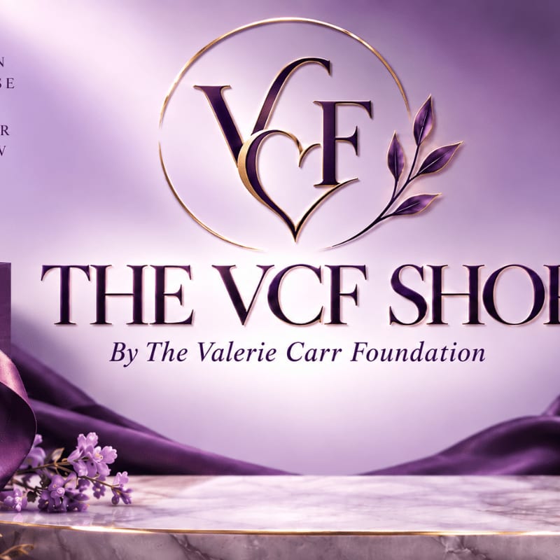 Purple flowers and a marble surface sit in the foreground against a soft purple background featuring the VCF logo and text.