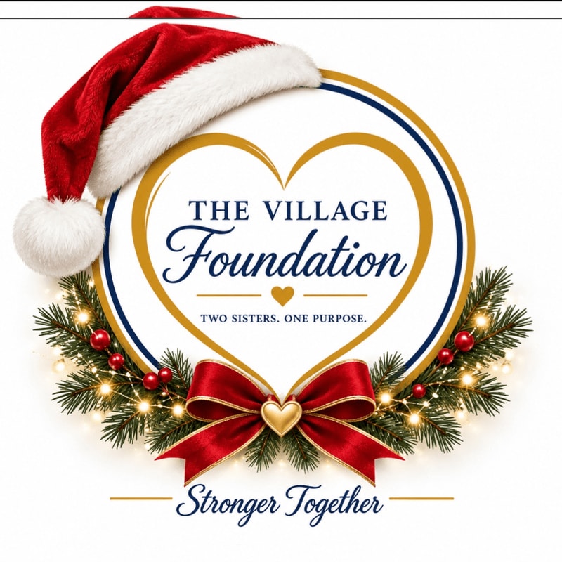 A logo for "The Village Foundation" featuring a gold heart and a red bow with pine branches in the foreground, topped with a Santa hat against a plain white background.