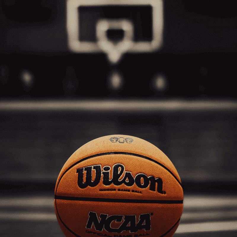a close up of a basketball on a court