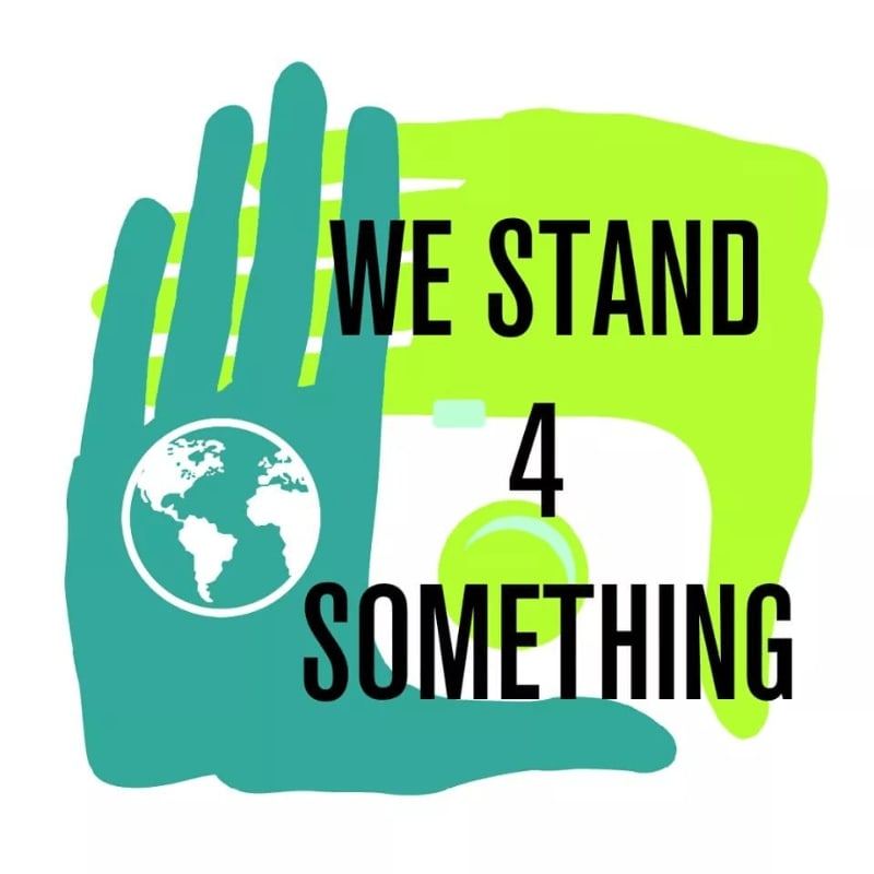 A teal hand silhouette containing a white globe sits in the foreground against a lime green background with the text "WE STAND 4 SOMETHING".