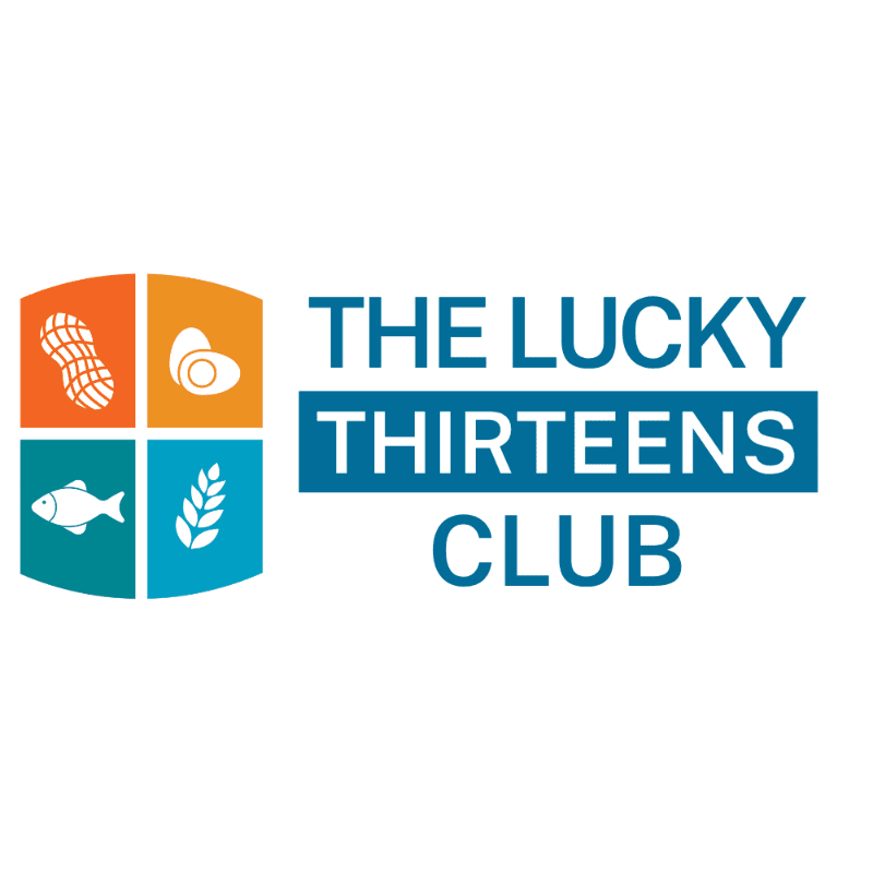 A colorful logo featuring a four-quadrant shield with food icons and the text "THE LUCKY THIRTEENS CLUB" set against a plain white background.