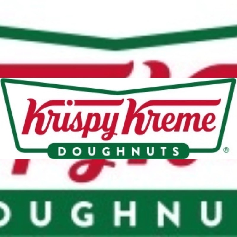 A Krispy Kreme Doughnuts logo is centered in the foreground against a blurred, larger version of the same logo in the background.