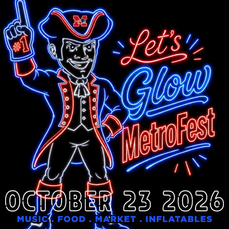 A neon-outlined colonial figure stands beside the glowing text "Let's Glow MetroFest" and the date "October 23 2026" against a solid black background.