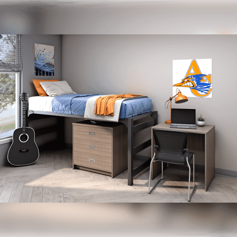 An acoustic guitar leans against a loft bed with a desk and chair underneath, set against a plain white wall with a sports poster.