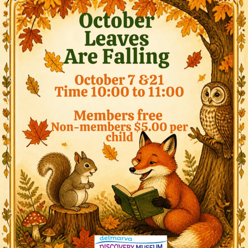 A fox reading a book to a squirrel and an owl in the foreground is set against a background of autumn leaves and a large tree.
