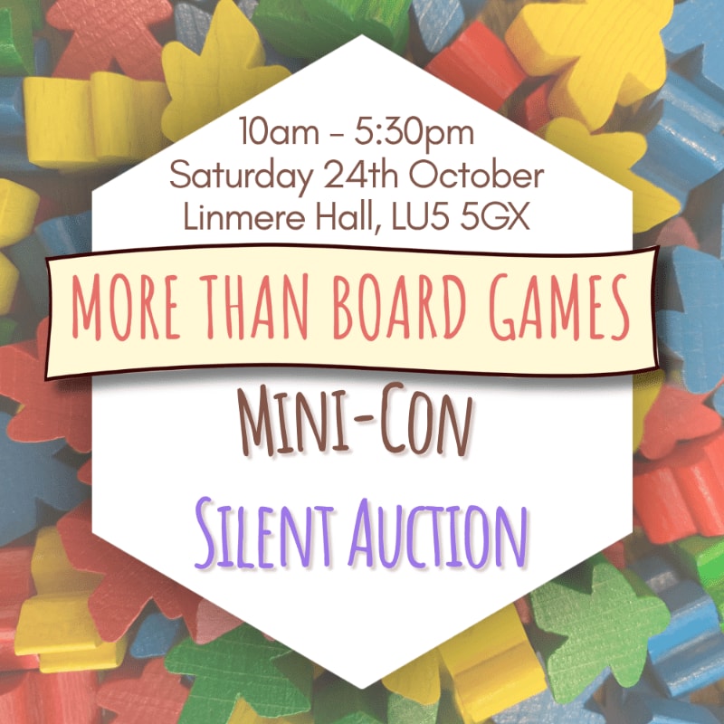 A white hexagonal event flyer with text for "More Than Board Games" sits in the foreground over a background of colorful wooden toy blocks.